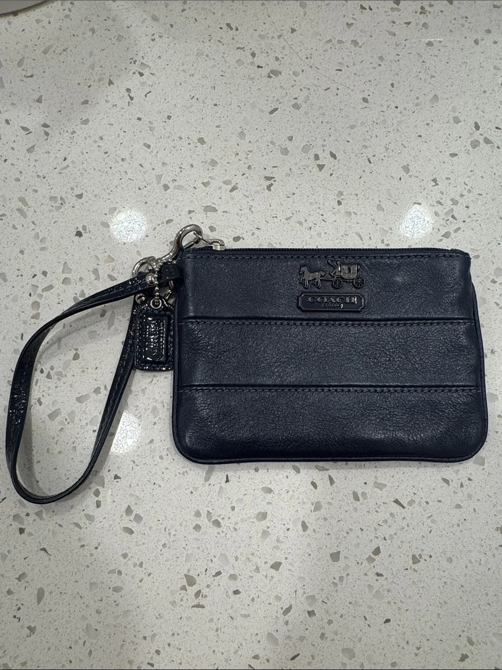 Coach navy Leather Zip Wristlet with Carriage Emblem